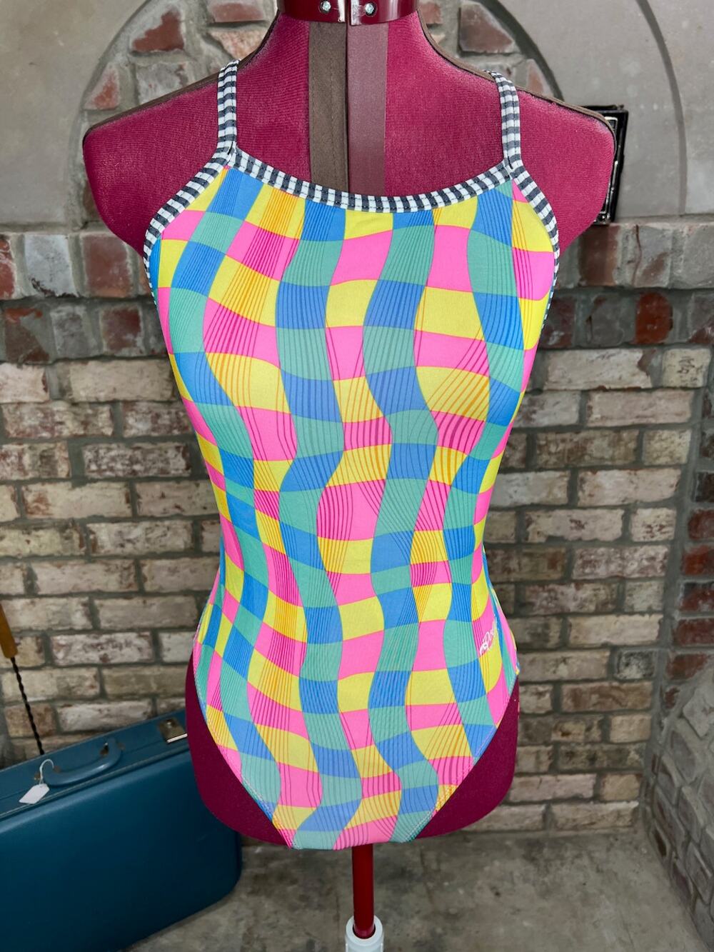 Dolphin swimsuit one piece waves yellow pink green blue